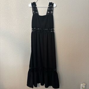 Elegant Black Sleeveless Dress with Lace Details